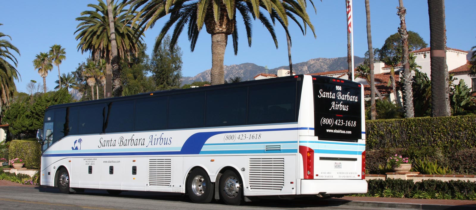 The Santa Barbara Airbus parked in front of the Biltmore hotel near Butterfly Beach.