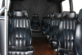 Black interior of a Santa Barbara mini limo bus.